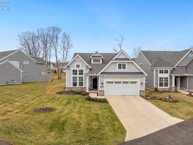 craftsman-style home featuring a garage and a front lawn