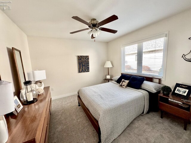 bedroom with carpet flooring and ceiling fan