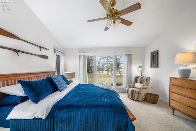 bedroom featuring lofted ceiling, carpet floors, and ceiling fan