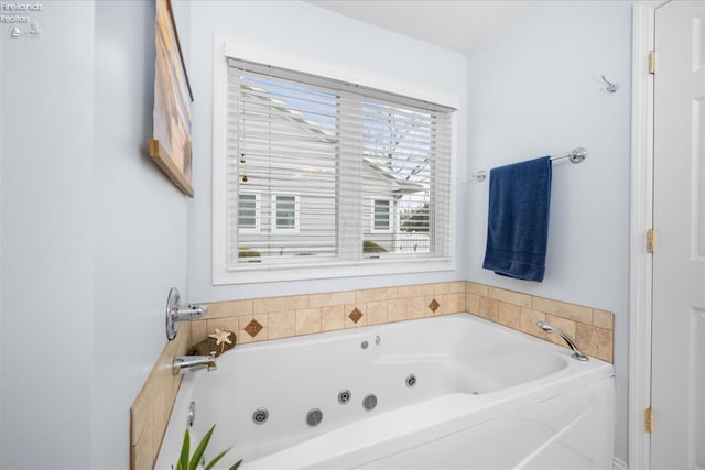 bathroom with a washtub