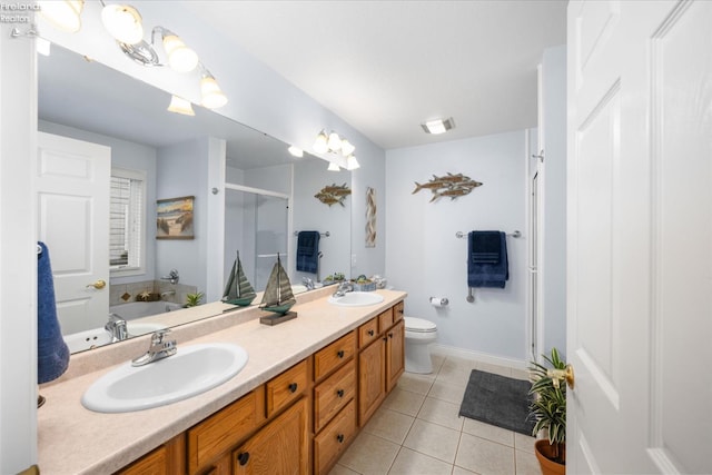 full bathroom with shower with separate bathtub, toilet, tile patterned floors, and vanity