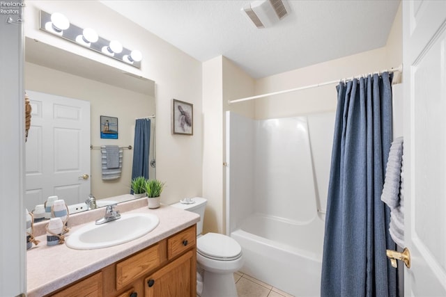 full bathroom with shower / bathtub combination with curtain, tile patterned flooring, vanity, a textured ceiling, and toilet