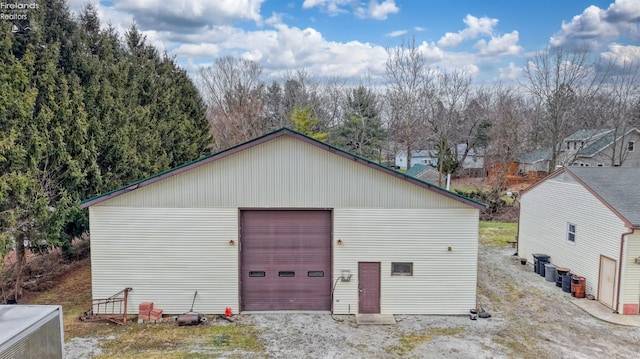 view of outbuilding featuring a garage