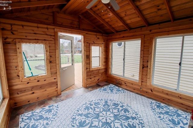 sunroom / solarium featuring wood ceiling, lofted ceiling with beams, and ceiling fan