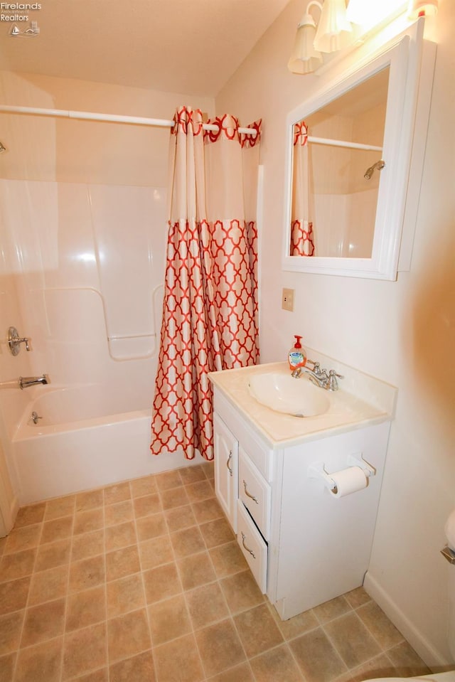 bathroom featuring shower / bath combination with curtain and vanity