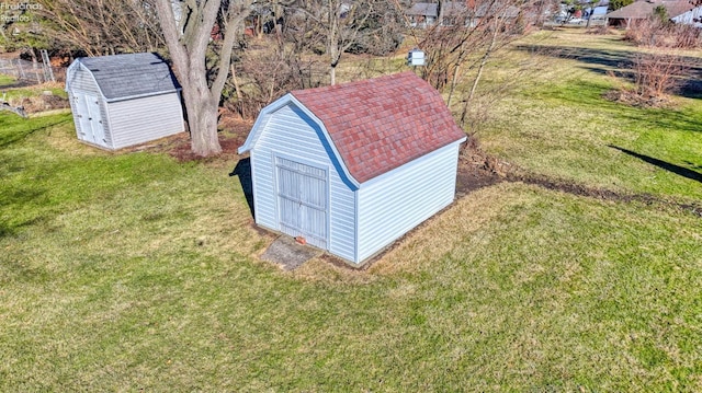 view of outdoor structure with a yard