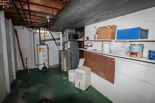 basement with gas water heater and heating unit