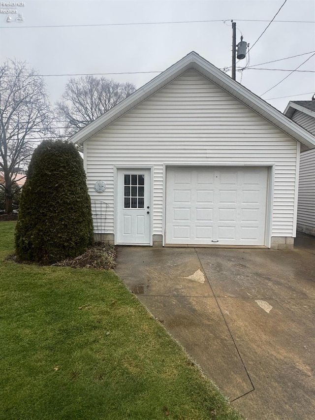 garage with a yard