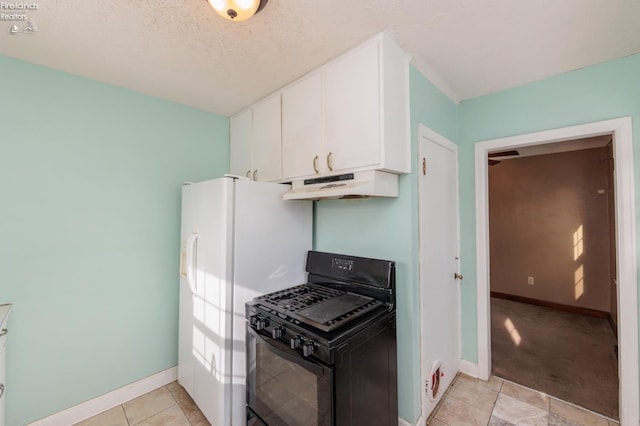 kitchen with white cabinetry, a textured ceiling, light tile patterned floors, and black gas range