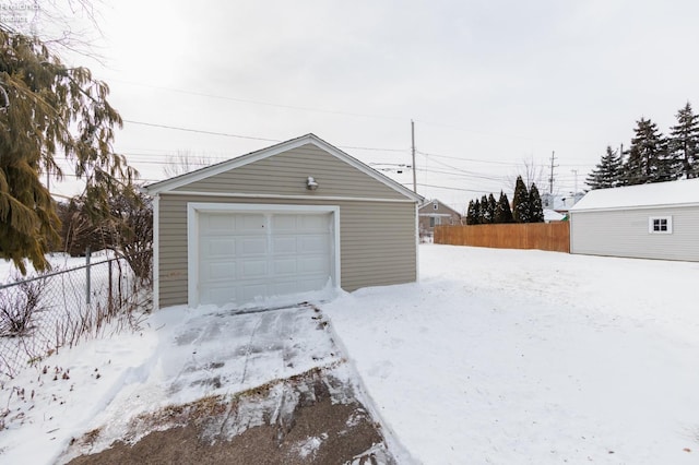 view of snow covered garage