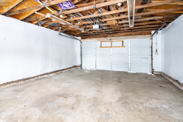 garage featuring a garage door opener