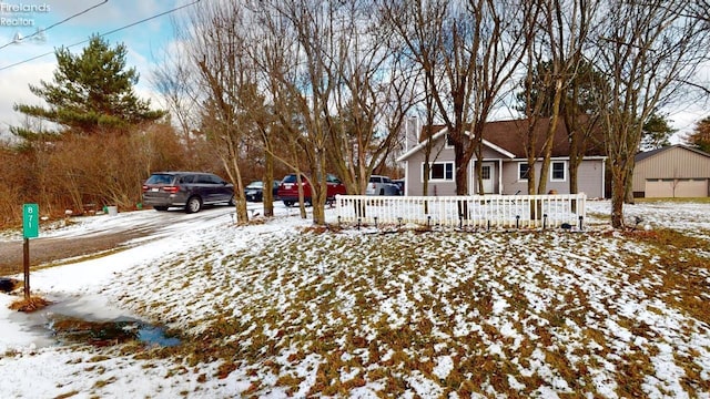 view of yard layered in snow