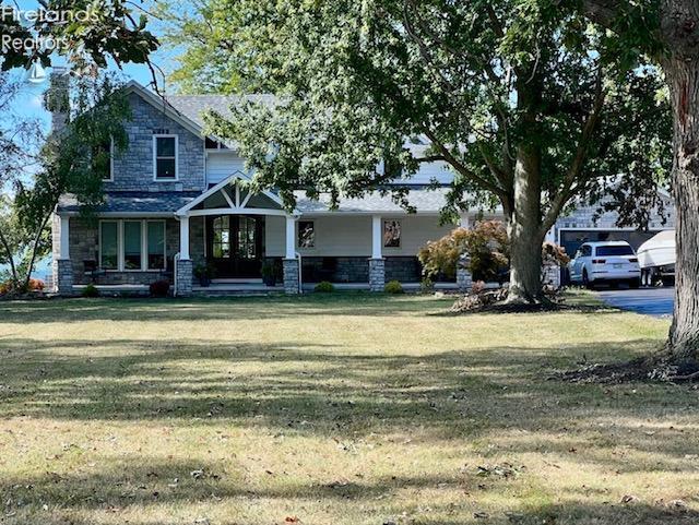 view of front of home with a front yard