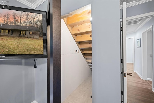 stairs featuring ornamental molding