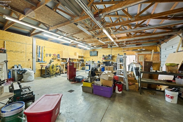 garage featuring a workshop area