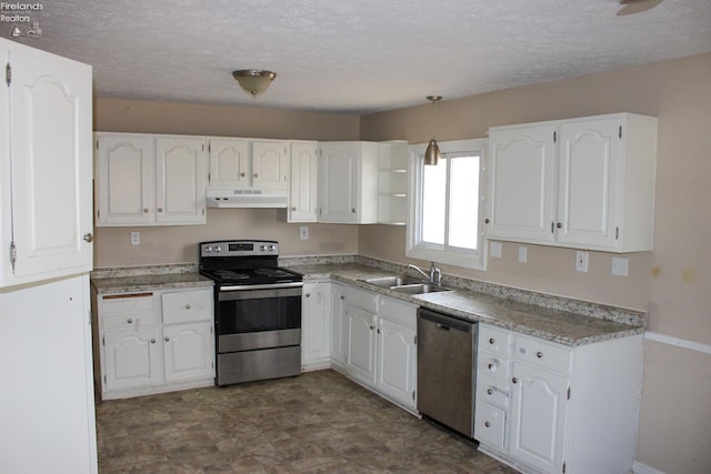 kitchen featuring sink, a textured ceiling, stainless steel appliances, and white cabinets