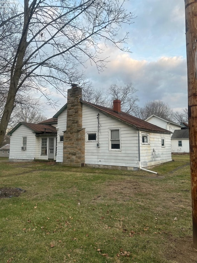 73 Center, Milan, OH 44846 - rear view of house with a lawn