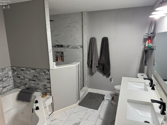 full bathroom with sink, plus walk in shower, and toilet