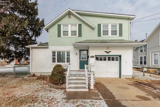 front of property featuring a garage