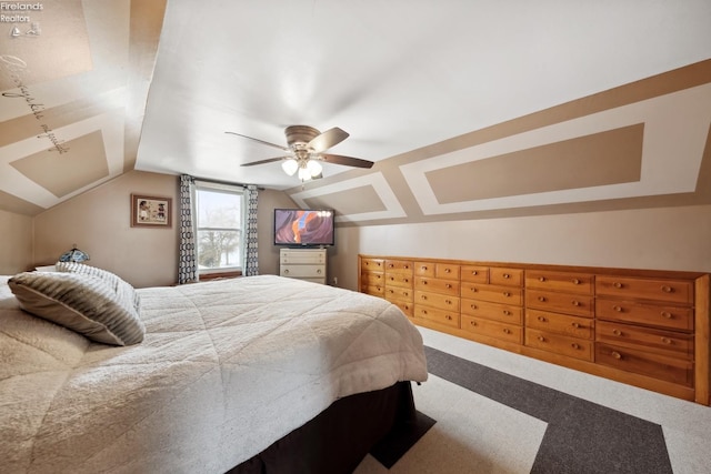 bedroom featuring vaulted ceiling, carpet, and ceiling fan