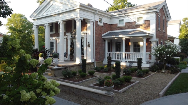 neoclassical home with covered porch