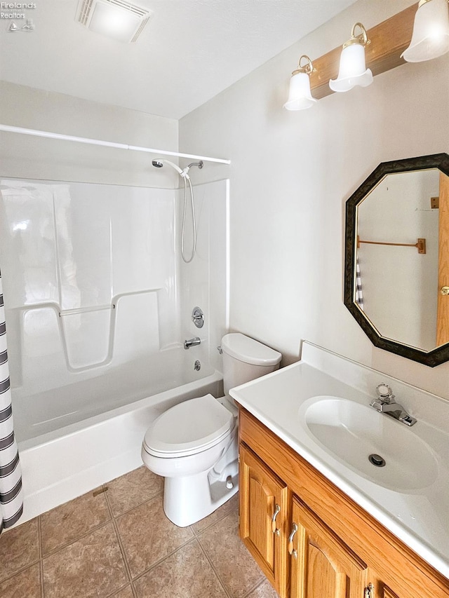 bathroom featuring visible vents, toilet, tile patterned floors, shower / bath combination with curtain, and vanity