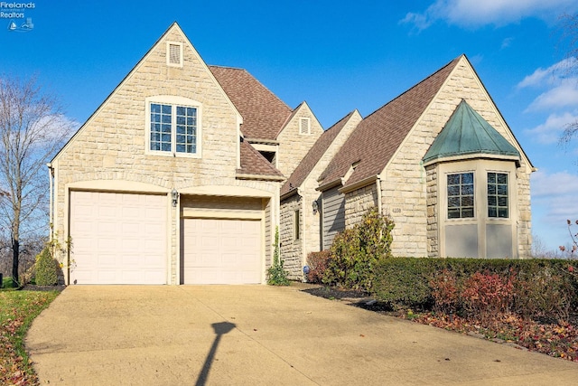 view of front of property featuring a garage