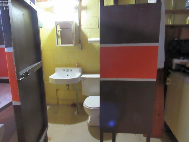 bathroom with sink and toilet