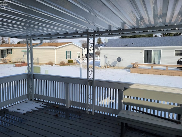 view of snow covered deck