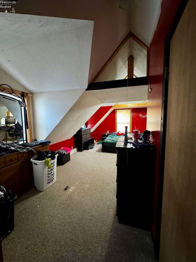 interior space with lofted ceiling and carpet