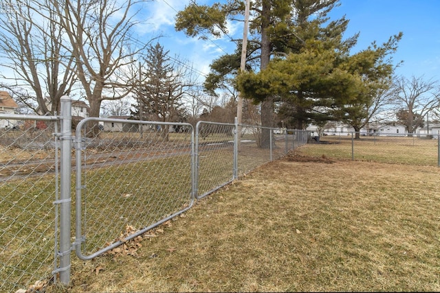 view of yard with a gate and fence