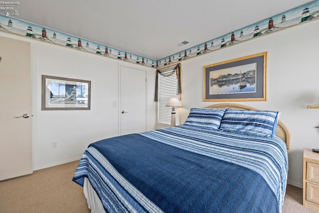 bedroom with light carpet, baseboards, and visible vents