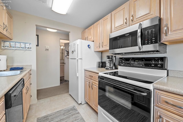 kitchen with light countertops, stainless steel microwave, dishwasher, and electric range