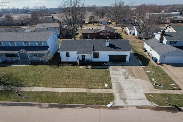 drone / aerial view with a residential view