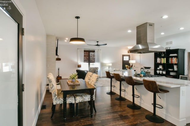 dining room featuring recessed lighting, visible vents, dark wood finished floors, and baseboards