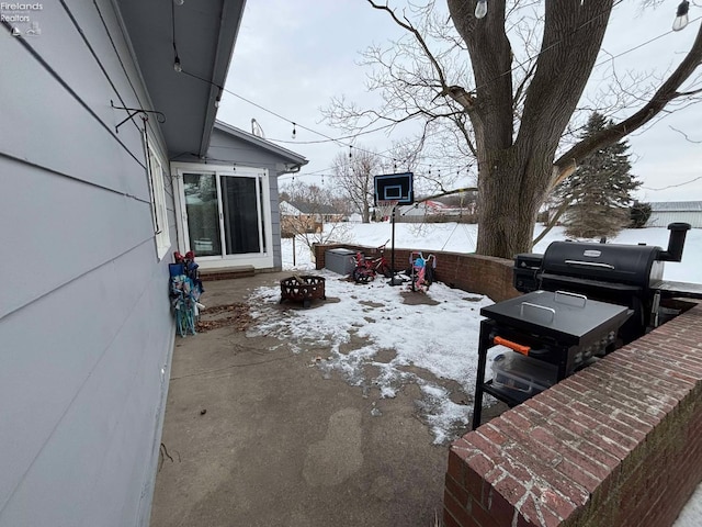 view of snow covered patio