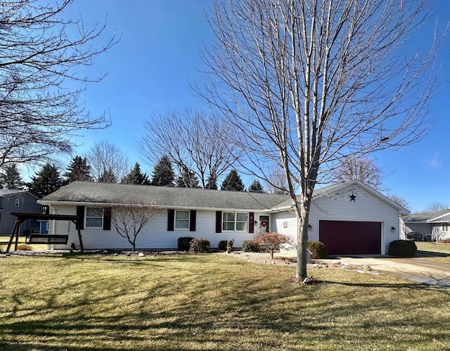 ranch-style house with a garage, driveway, and a front lawn