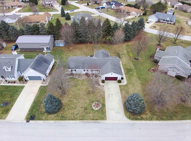 birds eye view of property with a residential view