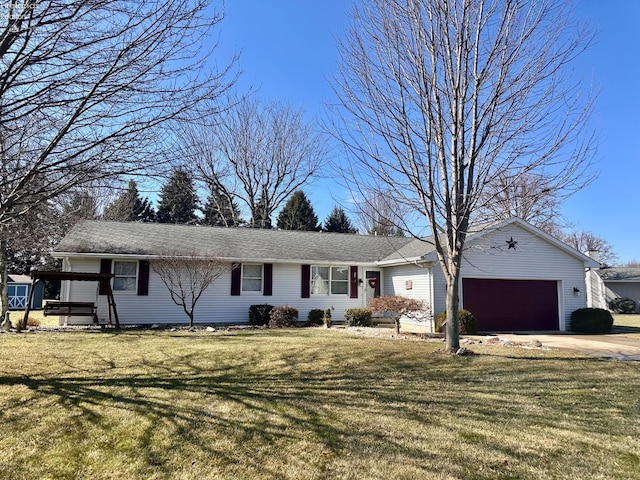 ranch-style house with concrete driveway, an attached garage, and a front lawn