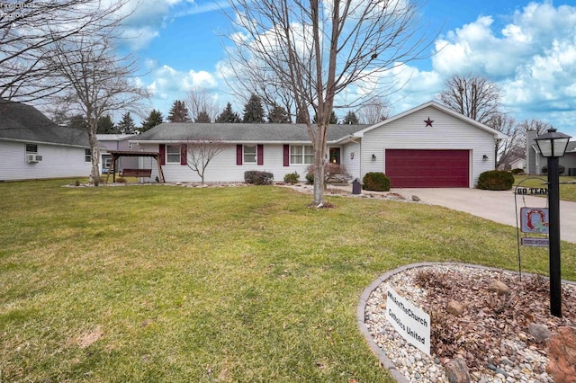 ranch-style house featuring a front yard, concrete driveway, and an attached garage