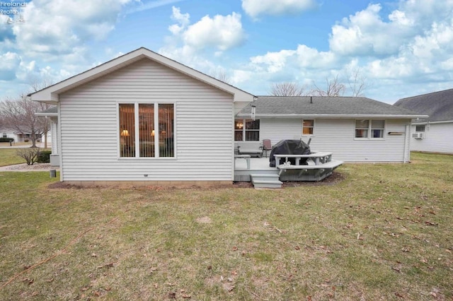 back of house with a yard and a wooden deck