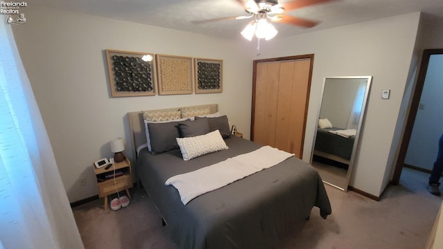 bedroom featuring carpet floors, baseboards, a ceiling fan, and a closet