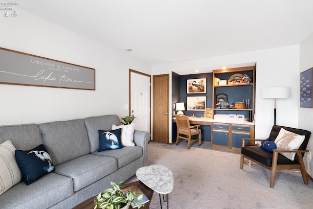 living room with light colored carpet