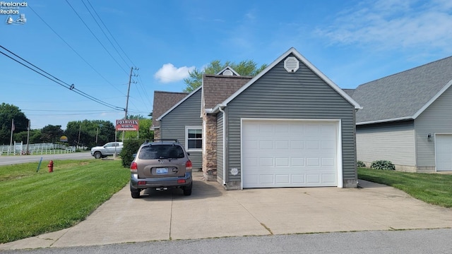 view of side of home with a garage, roof with shingles, driveway, and a lawn