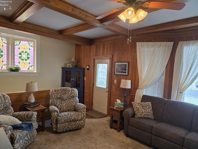 living area with a wealth of natural light, coffered ceiling, and beamed ceiling