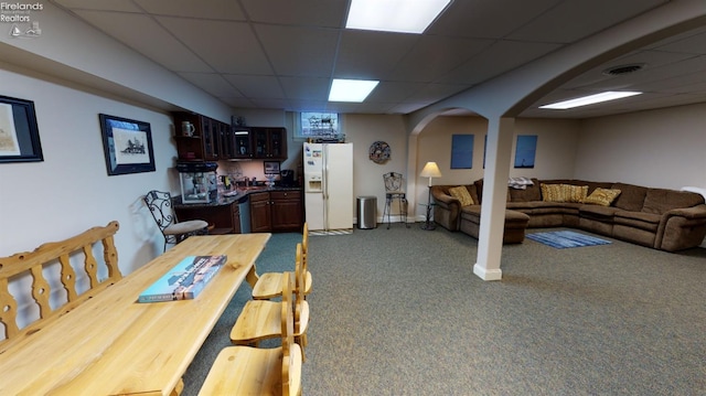 1876 N Lakewood Ave, Port Clinton, OH 43452 - dining room with dark colored carpet, visible vents, arched walkways, and a drop ceiling