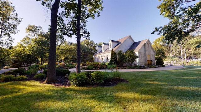 1876 N Lakewood Ave, Port Clinton, OH 43452 - view of property exterior featuring a lawn