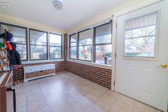 view of unfurnished sunroom