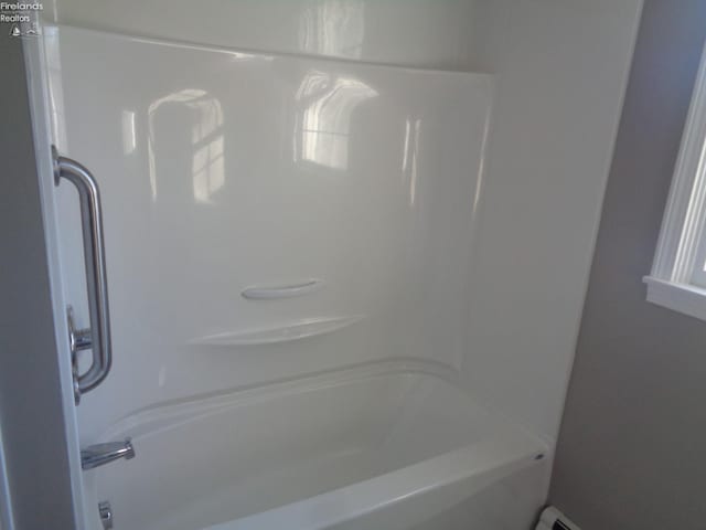 full bath with shower / bathing tub combination