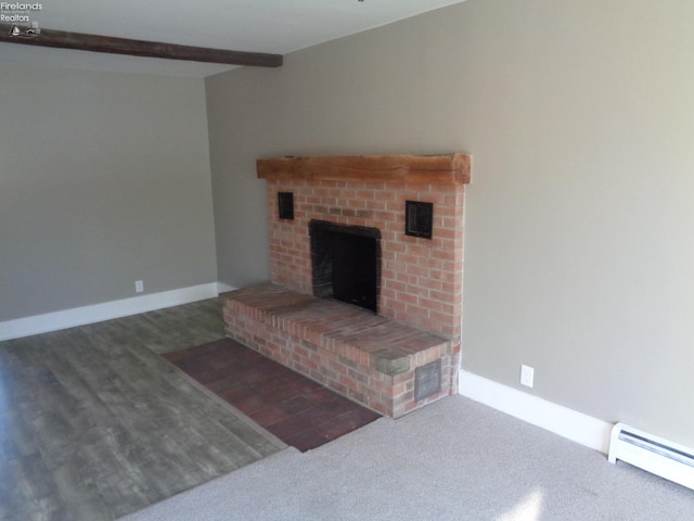 living area featuring a baseboard heating unit, a brick fireplace, beamed ceiling, and baseboards